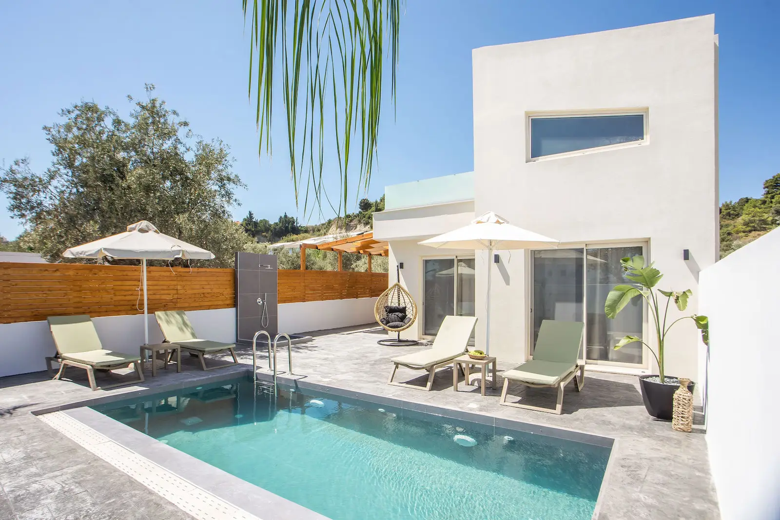 Private pool and sun terrace of an Aura villa in Afantou