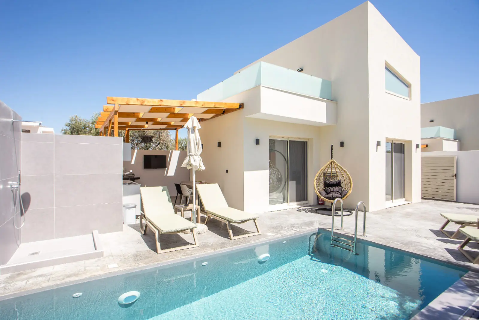 Pool with hanging swing chair