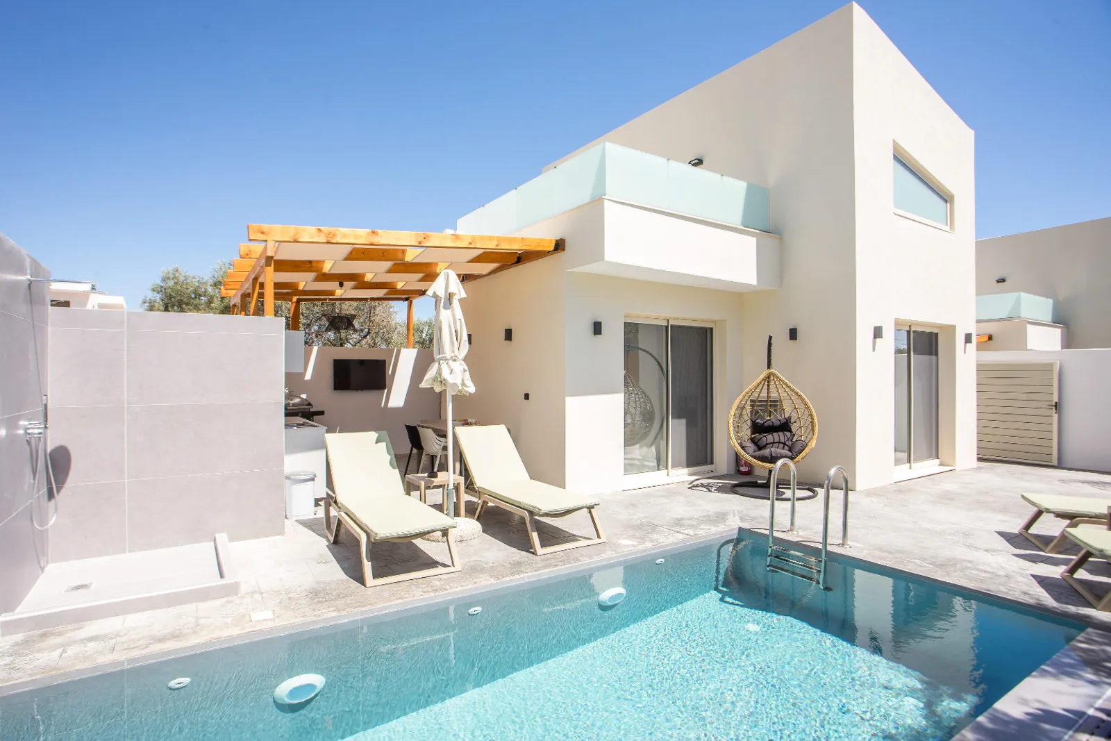 Pool with hanging swing chair